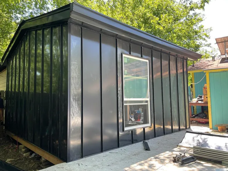 Black standing seam metal wall panels for Metal Roof Installation in Sultan